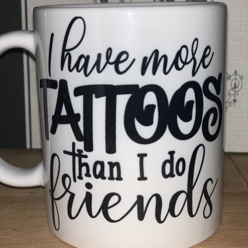 I have more tattoos than I do friends mug